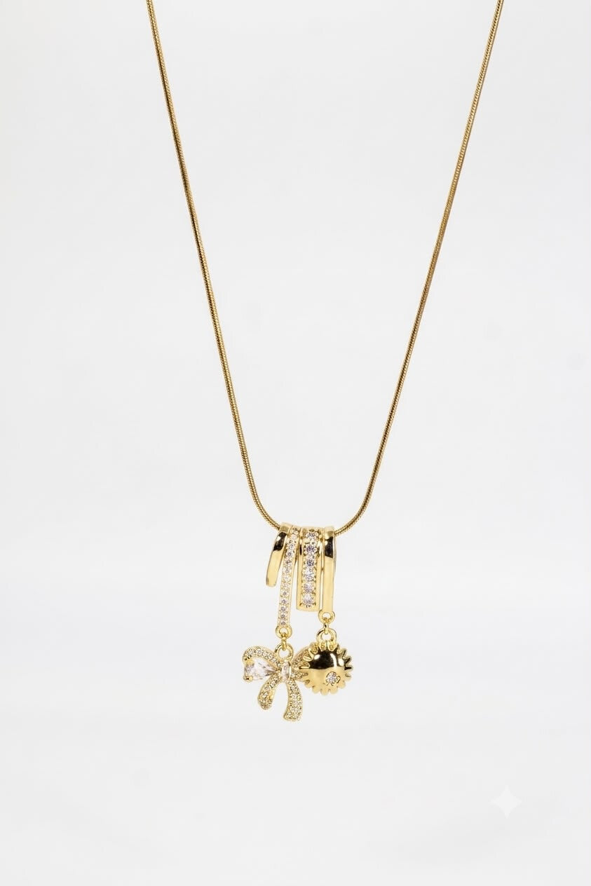Multi-Charm Gold Chain with Crystal Bow and Sun
