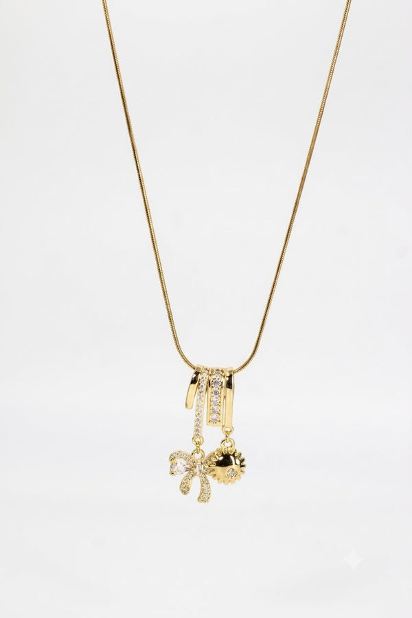 Multi-Charm Gold Chain with Crystal Bow and Sun