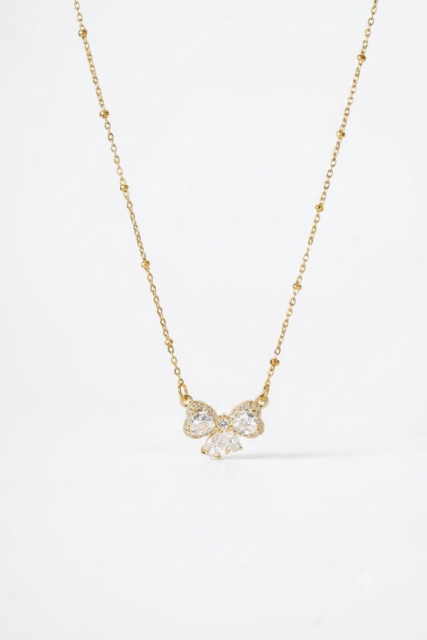 Beaded Gold Chain with Crystal Bow Pendant